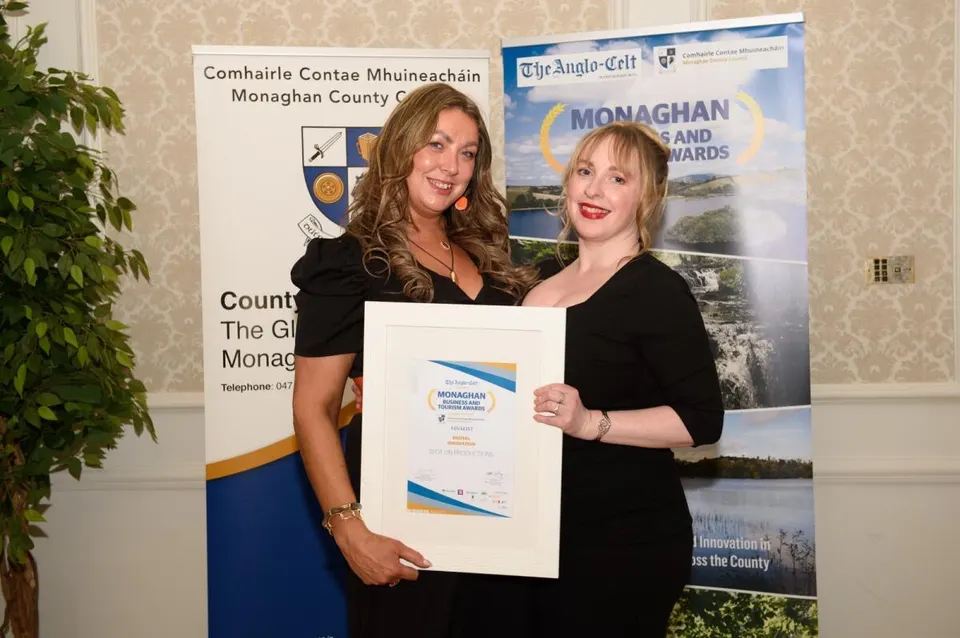 Grace and Sarah receiving a Monaghan county business award